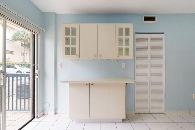 Building Photo - 5490 W 21st Ct