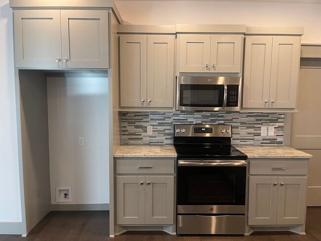 Building Photo - All Brick, 3 bedrooms AND 3 car garage