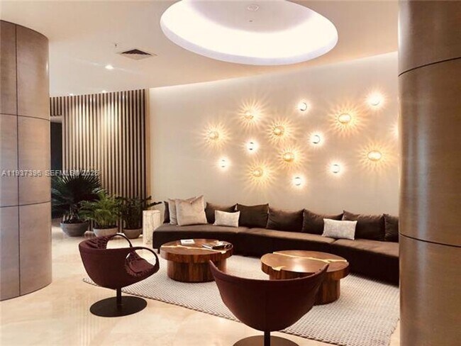 Building Photo - 10275 Collins Ave