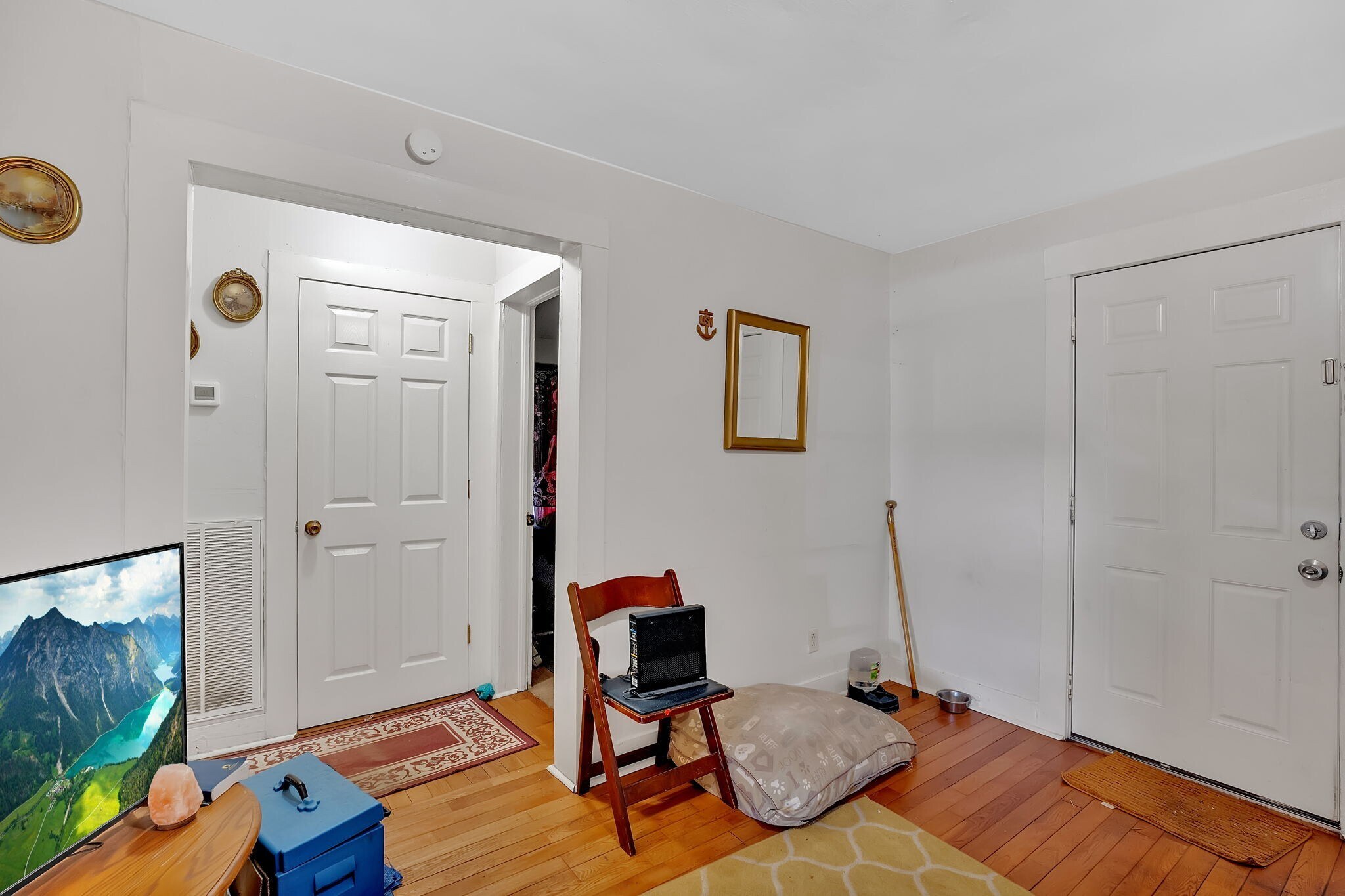Living room looking into hall that leads to bedrooms and bathrom - 203 3rd Ave NE