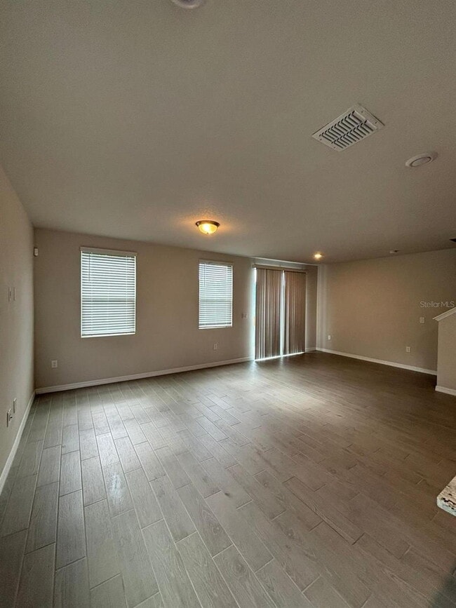 Building Photo - This beautiful townhouse features an abundance of space and natural light.