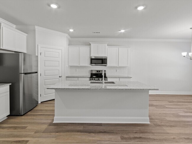 Building Photo - Spacious 4-Bed, 3-Bath New Home with 3-Car Garage and Private Owner’s Suite!