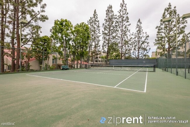 Building Photo - 1 br, 1 bath Condo - 5545 Canoga Ave, Wood...