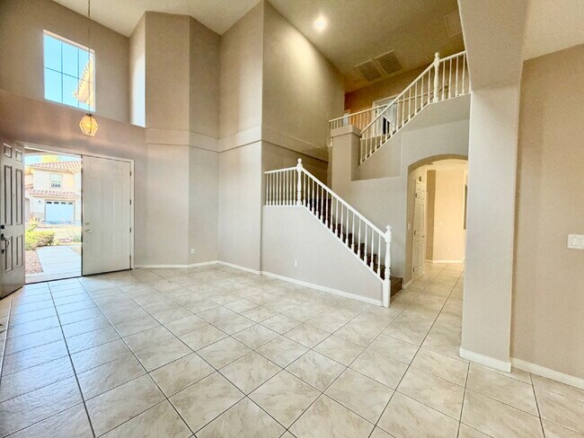 Building Photo - GATED SUMMERLIN HOME | 5 BEDROOM + DOWNSTAIRS DEN | 3-CAR GARAGE
