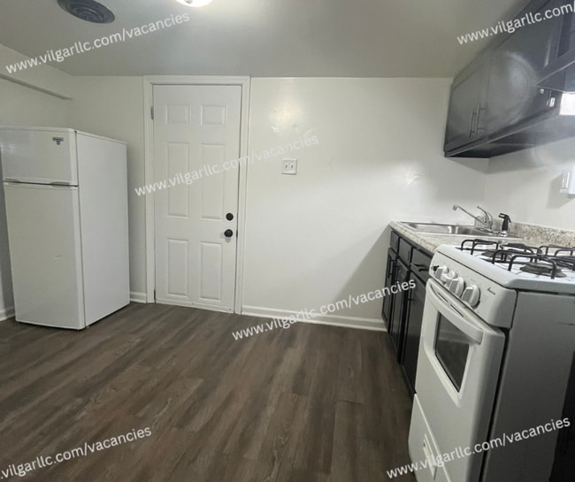 Building Photo - 1945 W 15th Ave