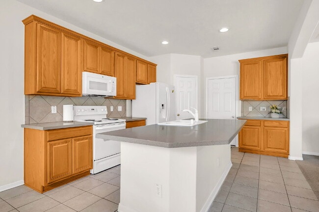 Building Photo - A beautifully maintained 3 bedroom, 2.5 bath home offering modern comfort in a quiet, desirable c...