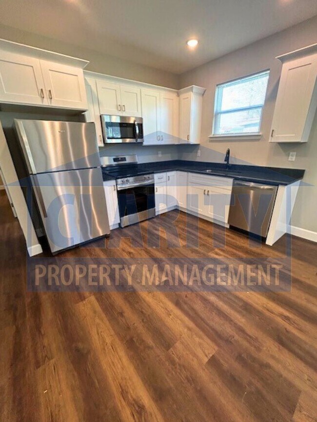 Building Photo - **One month free w/ a 15 month lease!**