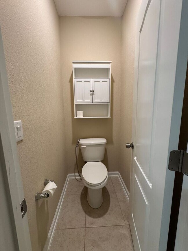 Building Photo - COMING SOON! Beautiful 4BR 3BA Home w/ Screened Lanai & Pond View • Garage Parking • Fenced Yard ...