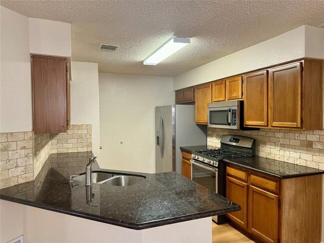 Building Photo - 8628 Piney Creek Bend