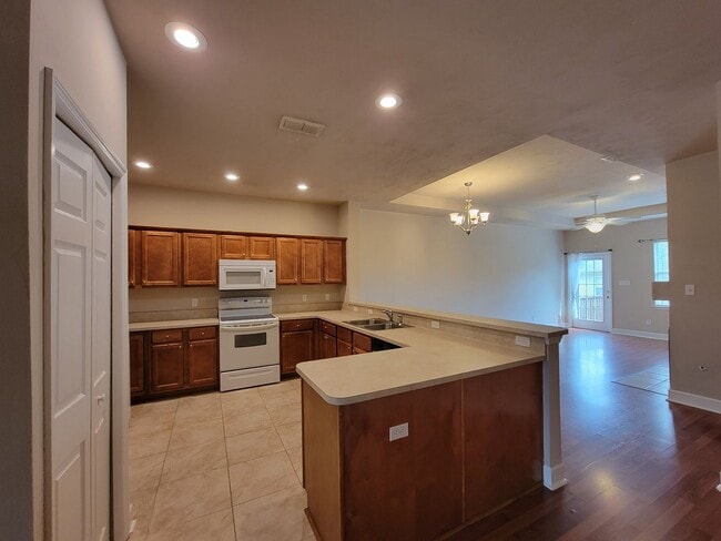 Building Photo - 3/2 townhome available for rent August 6, 2026, renting for $1795 per month, privacy fenced back ...