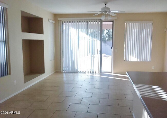 Building Photo - 6597 W Lawrence Ln