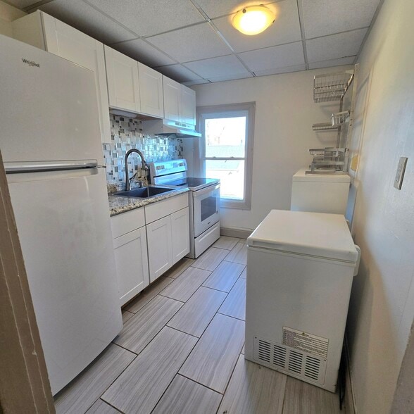 Freezer is not in kitchen any longer - 7 Wilson St