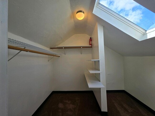 Building Photo - Cozy 2 Bed, 2 Bath Home with Parking Spaces and a Fenced Backyard!