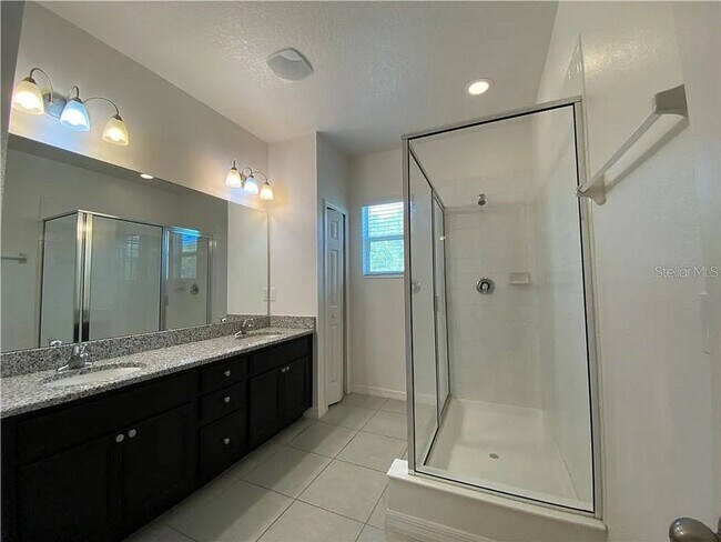 Building Photo - Beautiful End Unit Townhome Near Lake Nona w/ 2-Car Garage & Conservation Views!