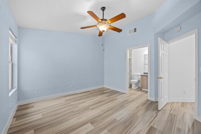 Building Photo - Charming and spacious single-story townhome nestled within a gated community in the desirable Nor...