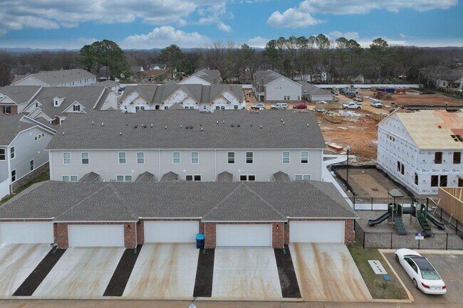 Building Photo - **BE THE FIRST PERSON TO LIVE IN THIS BRAND NEW BRICK TOWNHOME IN THE VILLAS AT REGAL SQUARE FEAT...