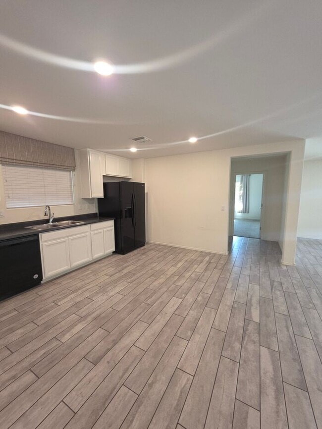 Building Photo - COMING SOON! New 3BR 2 BA Home w/ 2-Car Garage • Stainless Kitchen • Timer-Irrigated Yard in East...