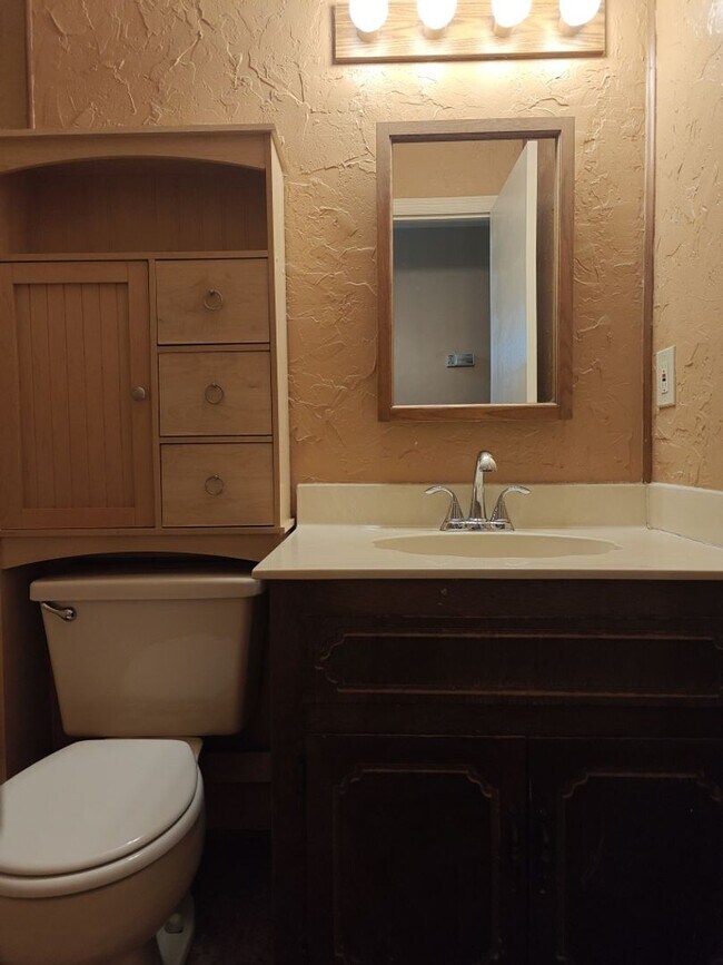 Building Photo - Elegant & Spacious 3-Bedroom Brick Home with Private Garage