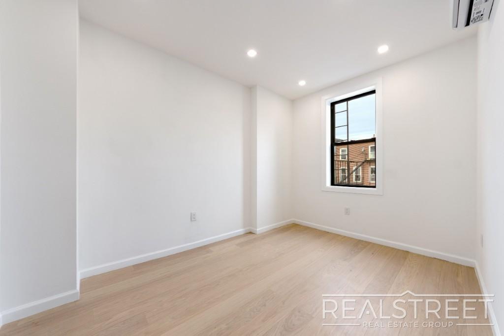 Building Photo - Spacious 2-Bedroom, 2-Bath Apartment in Bed-Stuy with Modern Amenities