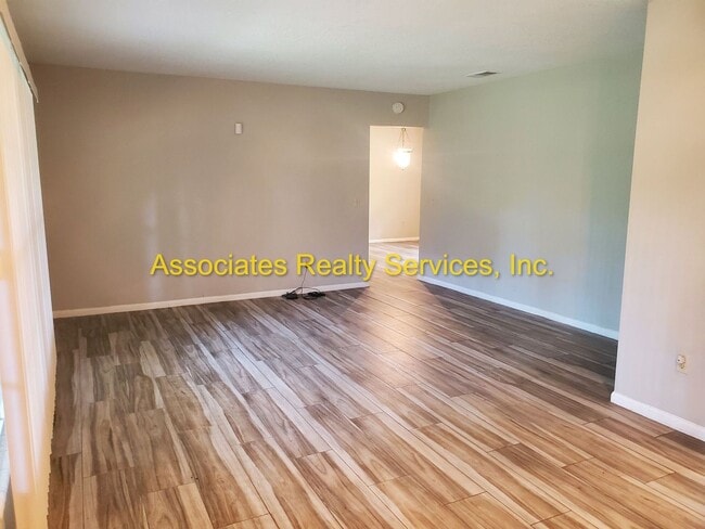 Building Photo - Three bedroom, two bath - 1720 Sq. ft., Acre lot