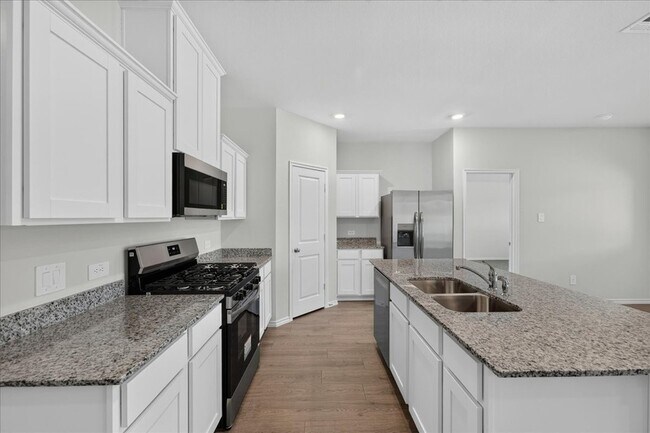 Building Photo - 717 Sweet Pea Dr
