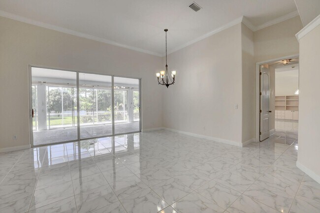 Building Photo - 8028 Plantation Lakes Dr