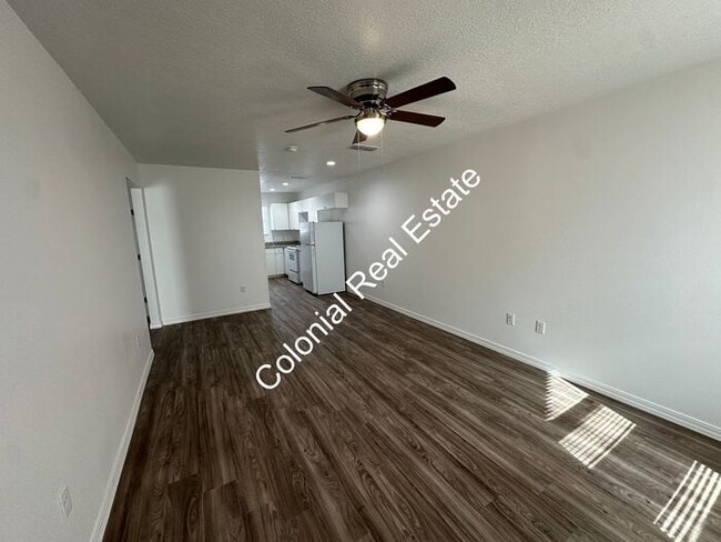 Building Photo - Spacious and updated 2 bedroom 2 bathroom apartment for rent. Central heat and air, granite count...