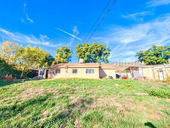 Building Photo - 3 Bedrooms, Big Back Yard, and Right Across from an Elementary School in North San Bernardino