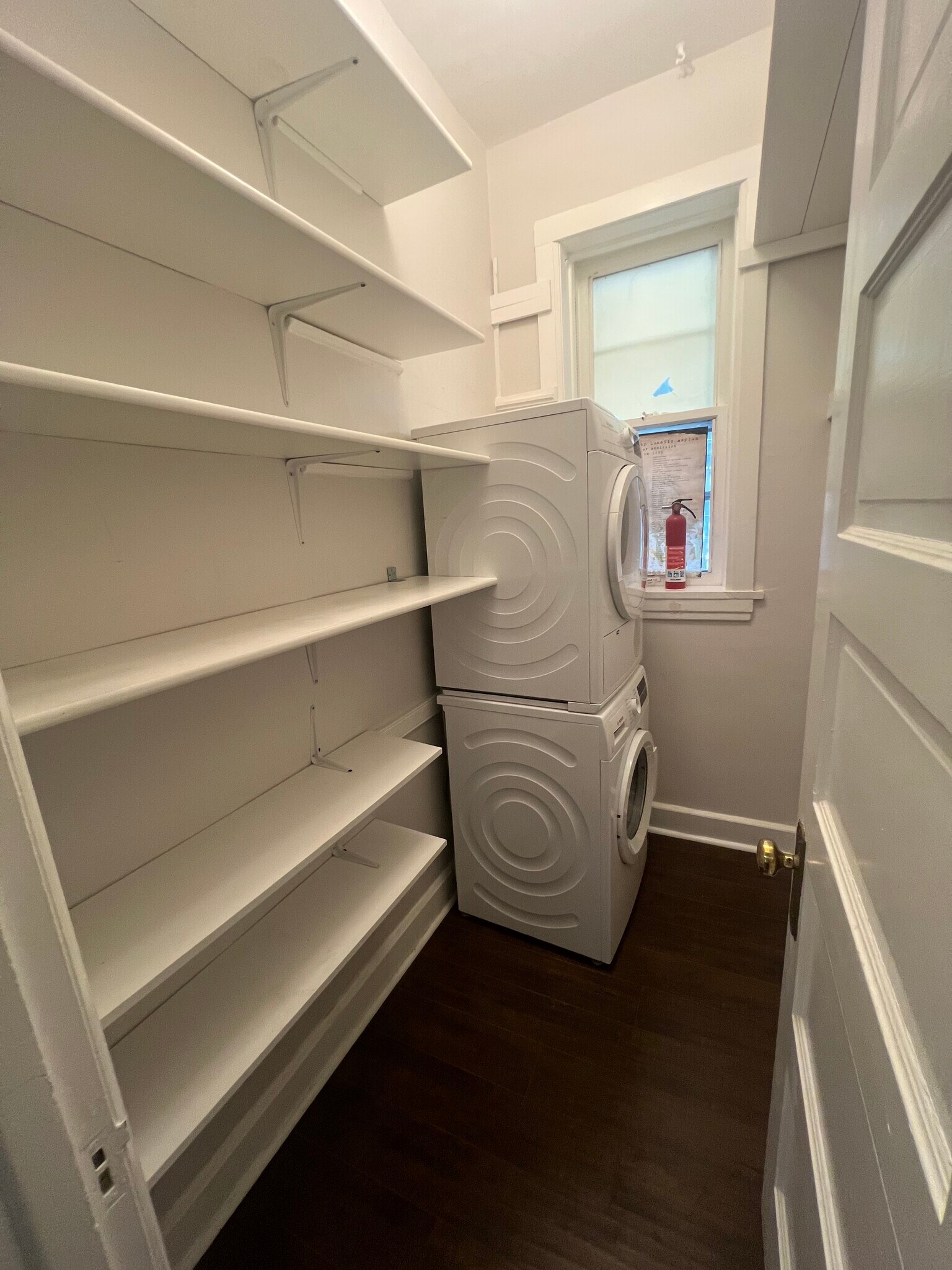 pantry with stacked washer and dryer - 4120 N Wolcott Ave