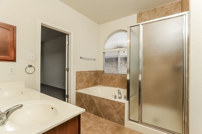 Building Photo - Spacious & Sun-Filled 4BR Retreat with Open-Concept Living and Versatile Dual Living Areas