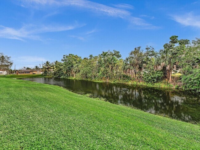 Building Photo - 6570 Royal Palm Blvd