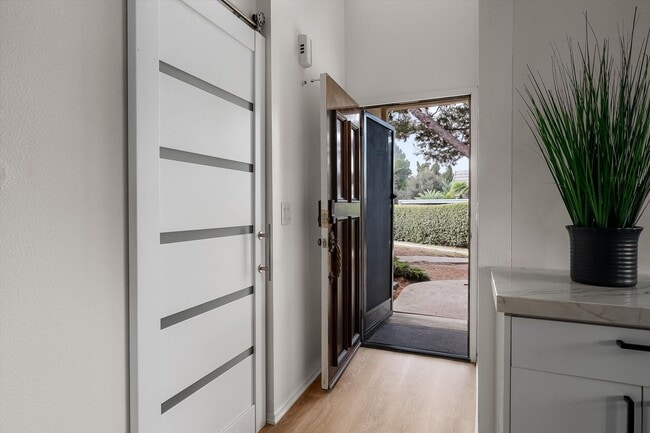 Building Photo - Furnished - Catch the Wave of Modern Comfort at Our Reef Oasis