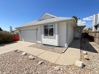 Building Photo - 4 Bedroom Home Available Near Research Pkwy & Scarborough Dr!
