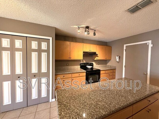 Building Photo - 6874 Playpark Trail W