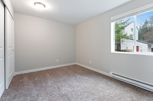 Building Photo - Large Two Bedroom Two Bath With Forest View! One Month Free!