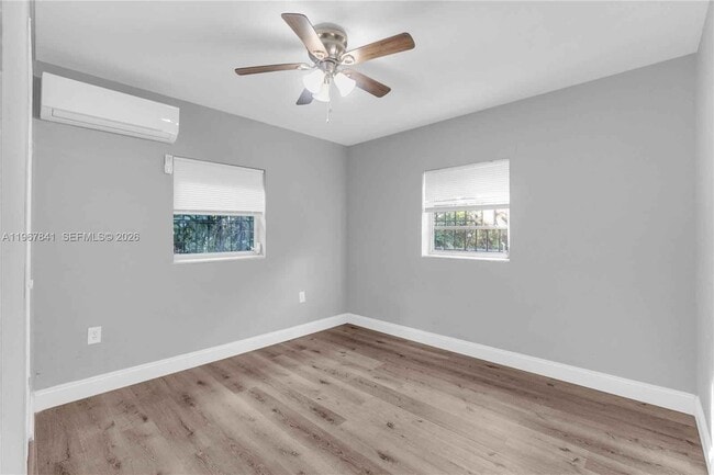 Building Photo - 6940 NW 6th Ct