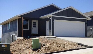 Building Photo - 5 BED | 2 BATH | DOUBLE GARAGE | RAPID VALLEY