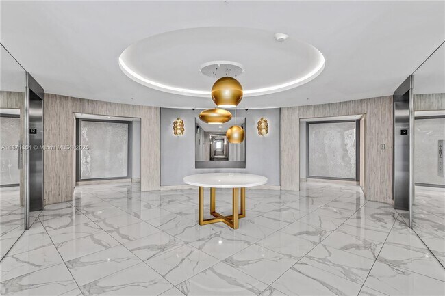 Building Photo - 10275 Collins Ave