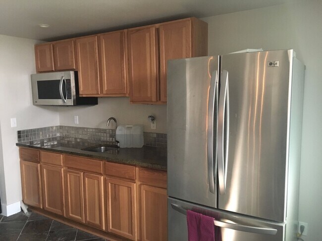 Building Photo - Live a Block Away from Sloan's Lake! Licen...
