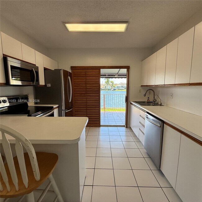 Building Photo - 6980 NW 173rd Dr