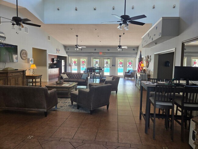 Building Photo - Freshly Painted 4BR/2BA Pool Home with Screened Pool & Spa – Move-In Ready!