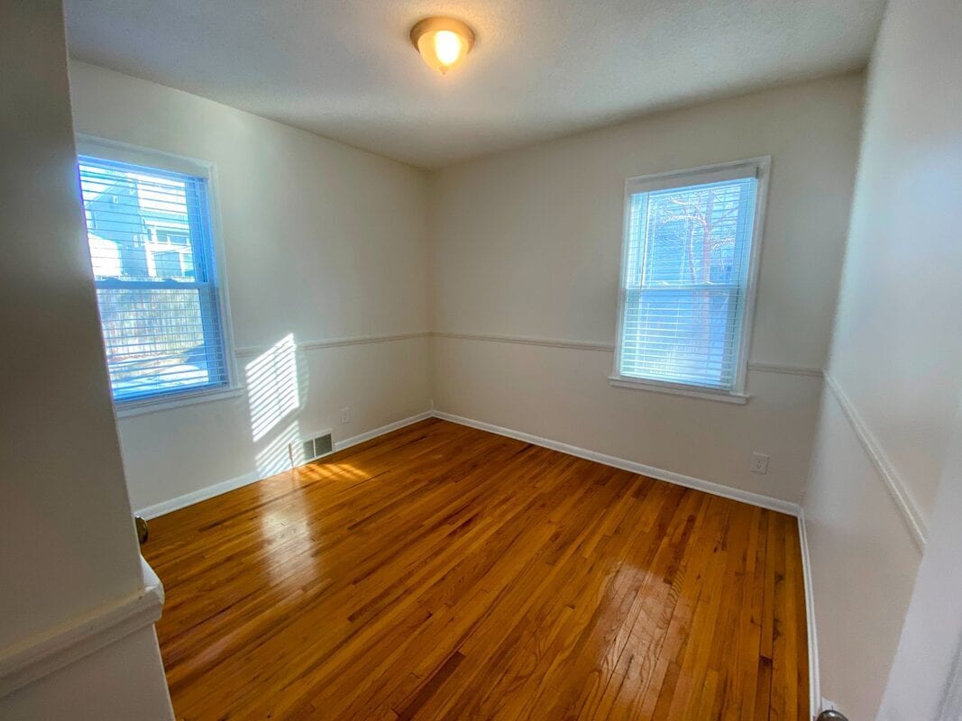Bedroom 3 - Bright and spacious with warm hardwood floors - 710 Sheridan Avenue North