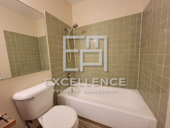 Building Photo - 2/1 Townhouse - Updated Kitchen, Community Pool, Storage, One Side of 2 Car Garage (For Storage)