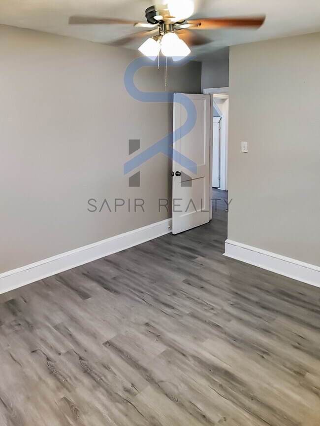 Building Photo - Move in before December 15th and choose your reward: a $250 Amazon Gift Card or a 55" Smart TV!