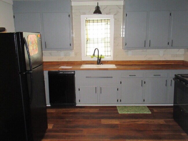 Building Photo - Downtown Living on the Rail Trail – Move-I...