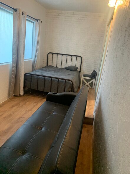Bedroom 2 includes full sized frame and mattress and full sized futon - 896 Raymond Dr