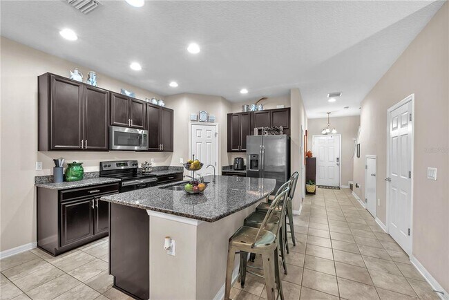 Building Photo - 7085 Woodchase Glen Dr