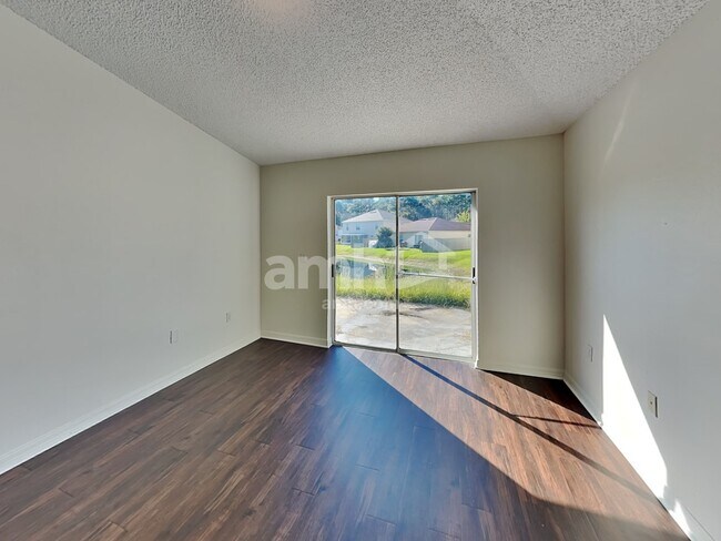 Building Photo - 8058 Misty Meadow Ct N