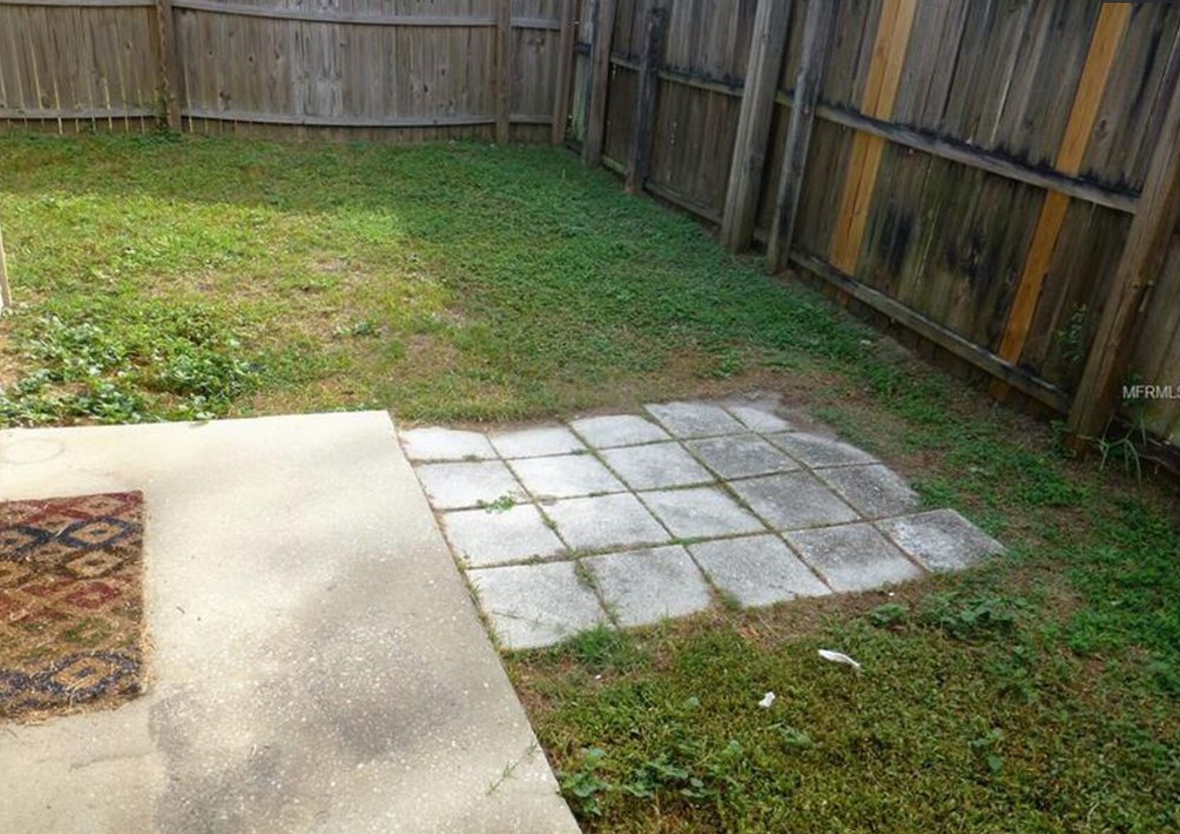 Private back patio and yard space is fully fenced - great for entertaining or small pets! - 1128 Park Green Pl