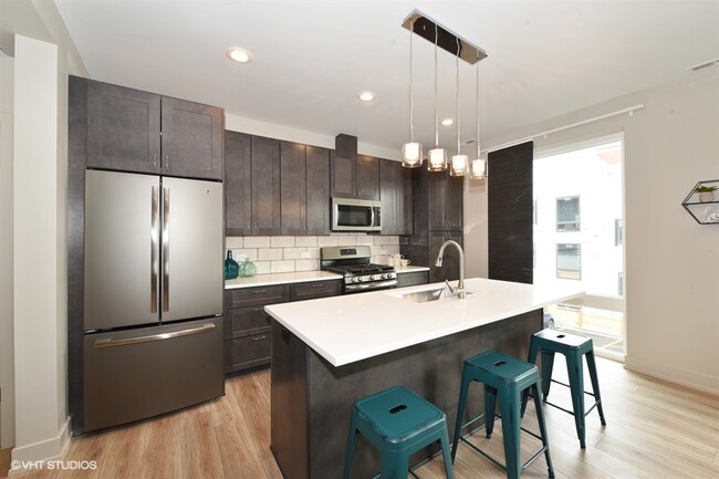 Kitchen with large island - HIGHPOINT Downers Grove on Rogers